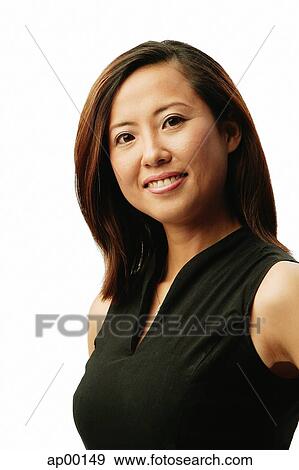 Stock Photo - Woman looking at camera, portrait. Fotosearch