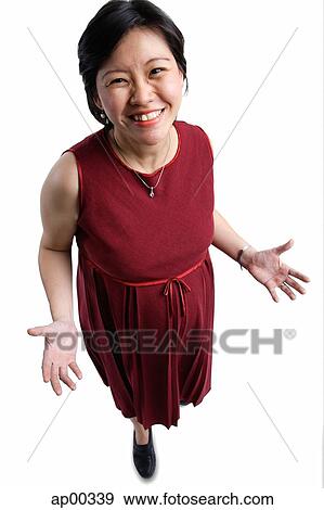 Woman looking at camera, smiling View Large Photo Image Stock Photo - Woman looking at camera, smiling. Fotosearch