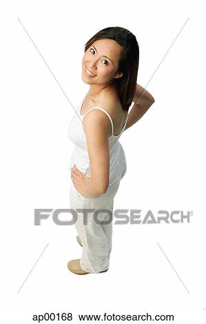 Woman smiling up at camera, hands on hips View Large Photo Image Stock Photo - Woman smiling up at camera, hands on hips. Fotosearch