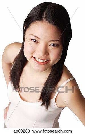 Young woman looking at camera, hands on hips View Large Photo Image Stock Image - Young woman looking at camera, hands on hips. Fotosearch