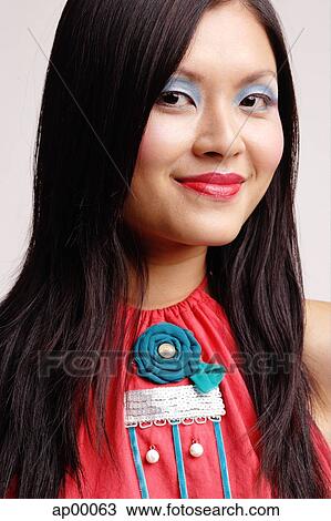 Young woman, looking at camera, portrait View Large Photo Image Stock Image - Young woman, looking at camera, portrait. Fotosearch