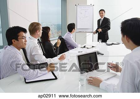 Business people in meeting View Large Photo Image Stock Photography - Business people in meeting . Fotosearch - Search Stock Photos, Pictures, Prints, Images, and Photo Clip Art