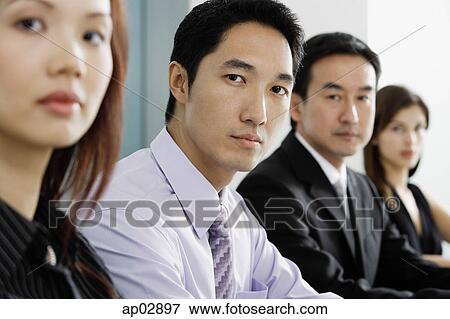Business people in a row View Large Photo Image Stock Photo - Business people in a row . Fotosearch