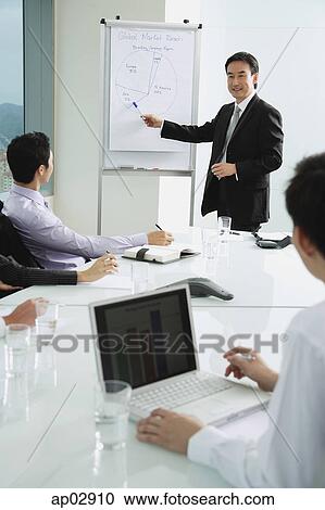 Businessman giving presentation View Large Photo Image Stock Image - Businessman giving presentation . Fotosearch