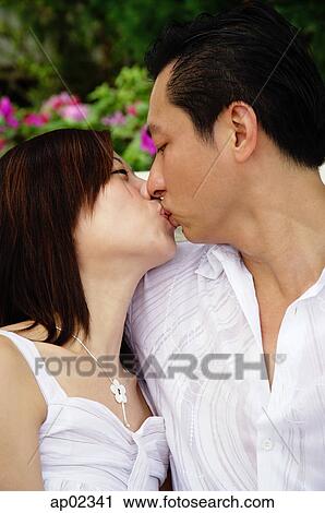 Couple kissing View Large Photo Image Stock Image - Couple kissing . Fotosearch