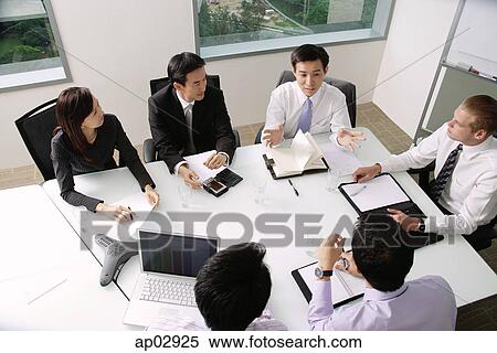 Executives at a meeting View Large Photo Image Stock Photography - Executives at a meeting . Fotosearch