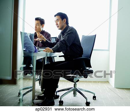 Executives having a meeting View Large Photo Image Stock Image - Executives having a meeting . Fotosearch