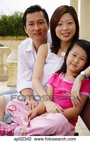 Family with one child, portrait View Large Photo Image Stock Image - Family with one child, portrait . Fotosearch