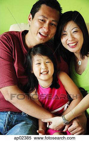 Family with one child, portrait View Large Photo Image Stock Photography - Family with one child, portrait. Fotosearch