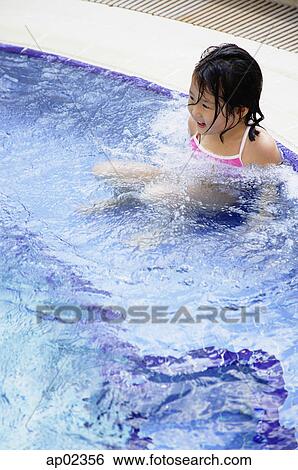 Girl in swimming pool View Large Photo Image Stock Photograph - Girl in swimming pool. Fotosearch