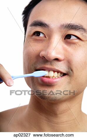 Man brushing teeth View Large Photo Image Stock Photo - Man brushing teeth . Fotosearch