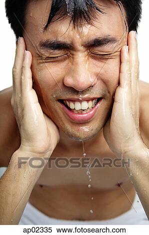Man washing face View Large Photo Image Stock Photography - Man washing face . Fotosearch