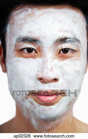 Stock Photograph - Man with face mask on . Fotosearch