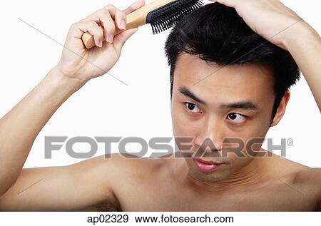 Stock Photo - Man with hair brush . Fotosearch