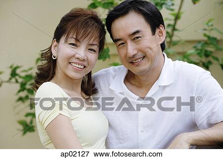 Mature couple, smiling at camera View Large Photo Image Stock Photo - Mature couple, smiling at camera . Fotosearch