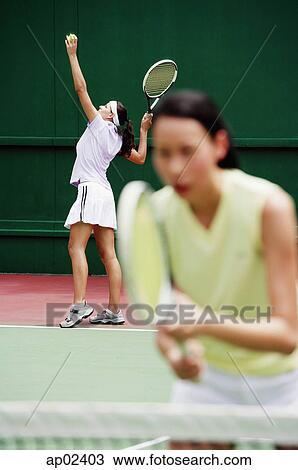 Stock Image - Tennis, mixed doubles . Fotosearch