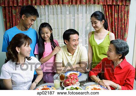 Three generation family at home View Large Photo Image Stock Photo - Three generation family at home. Fotosearch