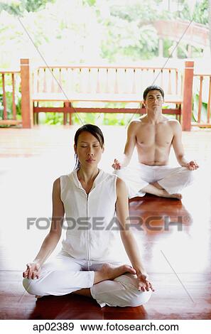 Two people in yoga position View Large Photo Image Stock Photo - Two people in yoga position . Fotosearch