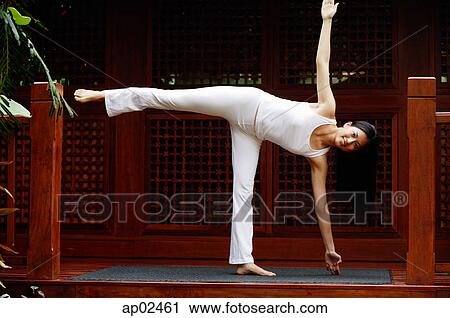 Stock Image - Woman doing yoga . Fotosearch