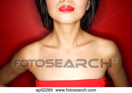 Woman in red tube tope with red lipstick View Large Photo Image Stock Photography - Woman in red tube tope with red lipstick . Fotosearch