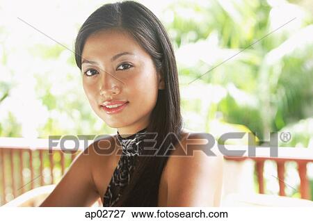 Woman looking at camera View Large Photo Image Stock Photo - Woman looking at camera . Fotosearch