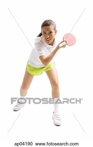 Young woman playing table tennis View Large Photo Image Stock Photography - Young woman playing table tennis. Fotosearch - Search Stock Photos, Pictures, Wall Murals, Images, and Photo Clipart