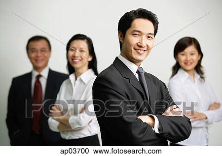 Business people looking at camera View Large Photo Image Stock Image - Business people looking at camera . Fotosearch