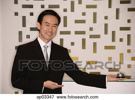 Businessman standing with arms outstretched, smiling View Large Photo Image Stock Photo - Businessman standing with arms outstretched, smiling . Fotosearch
