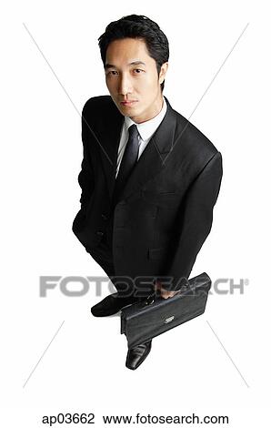 Businessman with briefcase View Large Photo Image Stock Image - Businessman with briefcase. Fotosearch