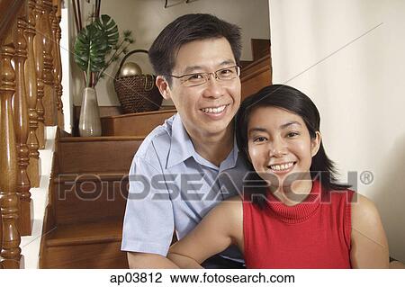 Couple smiling at camera View Large Photo Image Stock Image - Couple smiling at camera . Fotosearch