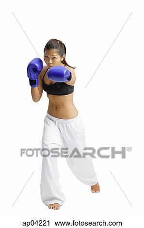 Female boxer, wearing boxing gloves, facing camera View Large Photo Image Stock Image - Female boxer, wearing boxing gloves, facing camera. Fotosearch