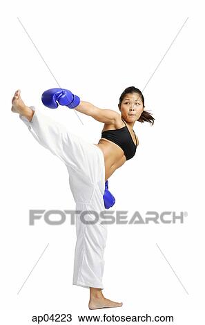 Stock Image - Female kickboxer. Fotosearch