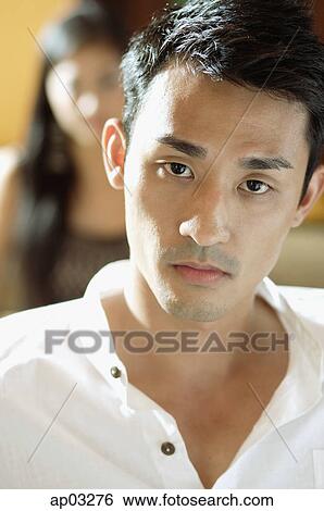 Stock Photograph - Man looking at camera. Fotosearch