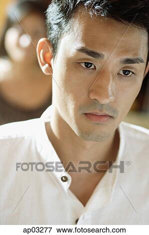 Man looking away, sad expression View Large Photo Image Stock Photo - Man looking away, sad expression. Fotosearch