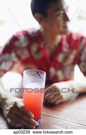 Man with drink, selective focus View Large Photo Image Stock Photo - Man with drink, selective focus . Fotosearch