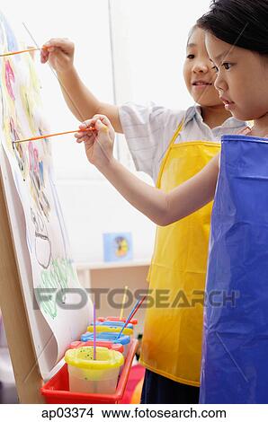 Picture - Two young girls painting . Fotosearch