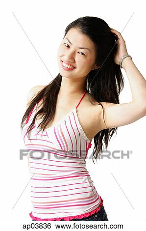 Woman in striped sleeveless top, smiling at camera View Large Photo Image Stock Photograph - Woman in striped sleeveless top, smiling at camera. Fotosearch