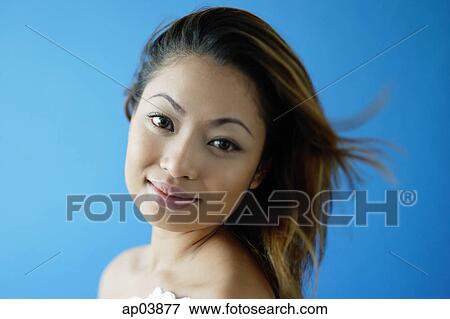 Woman looking at camera, head shot View Large Photo Image Stock Photo - Woman looking at camera, head shot. Fotosearch