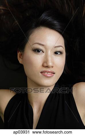 Woman looking at camera View Large Photo Image Stock Image - Woman looking at camera. Fotosearch