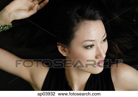 Woman looking away View Large Photo Image Stock Image - Woman looking away. Fotosearch