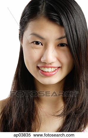 Stock Photography - Woman smiling, head shot. Fotosearch