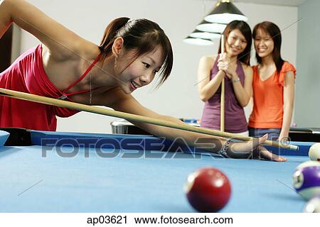 Women playing pool View Large Photo Image Stock Image - Women playing pool. Fotosearch