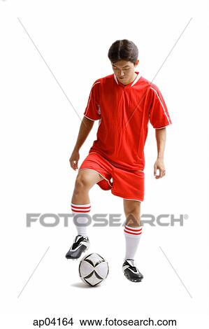 Young man in soccer uniform with soccer ball View Large Photo Image Picture - Young man in soccer uniform with soccer ball. Fotosearch