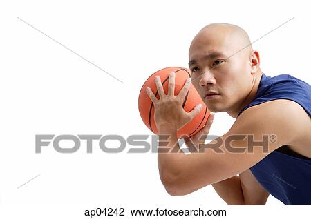 Young man playing basketball View Large Photo Image Stock Image - Young man playing basketball. Fotosearch