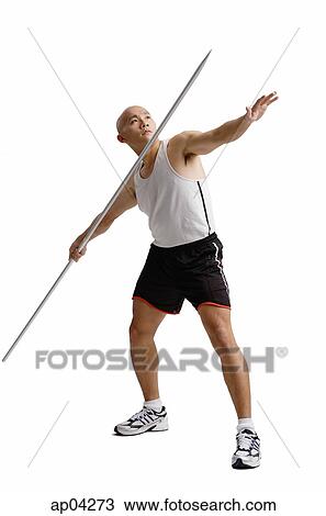 Young man preparing to throw javelin View Large Photo Image Stock Image - Young man preparing to throw javelin . Fotosearch