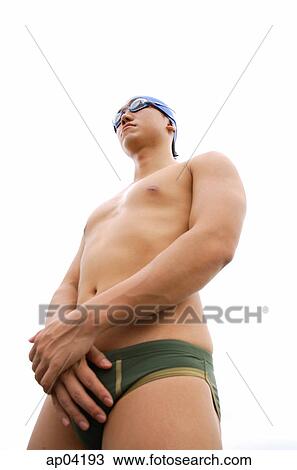 Young man with swim cap and goggles, hands clasped View Large Photo Image Stock Image - Young man with swim cap and goggles, hands clasped. Fotosearch