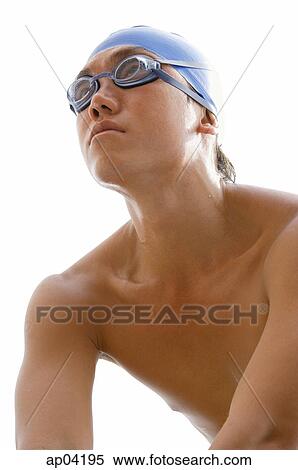 Young man with swim cap and goggles View Large Photo Image Stock Photography - Young man with swim cap and goggles. Fotosearch