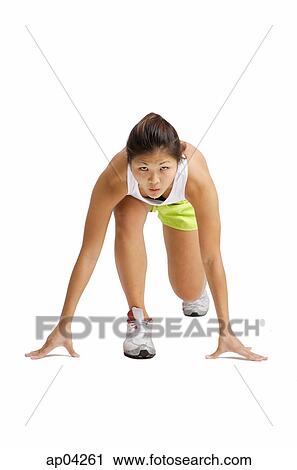 Young woman in starting position View Large Photo Image Stock Image - Young woman in starting position. Fotosearch