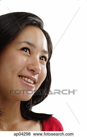 Young woman looking away, head shot View Large Photo Image Stock Photo - Young woman looking away, head shot. Fotosearch