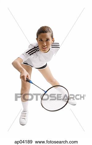 Young woman playing badminton, studio shot View Large Photo Image Stock Photo - Young woman playing badminton, studio shot. Fotosearch
